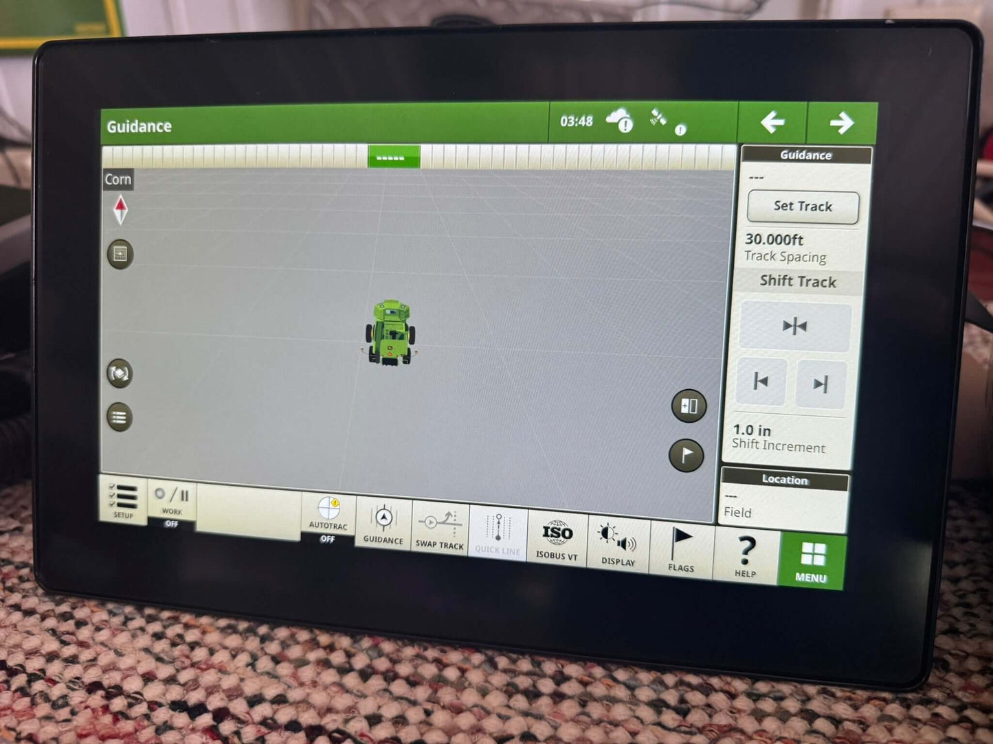 Front view of John Deere G5 Universal Display with AutoTrac activation