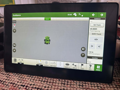 Front view of John Deere G5 Universal Display with AutoTrac activation